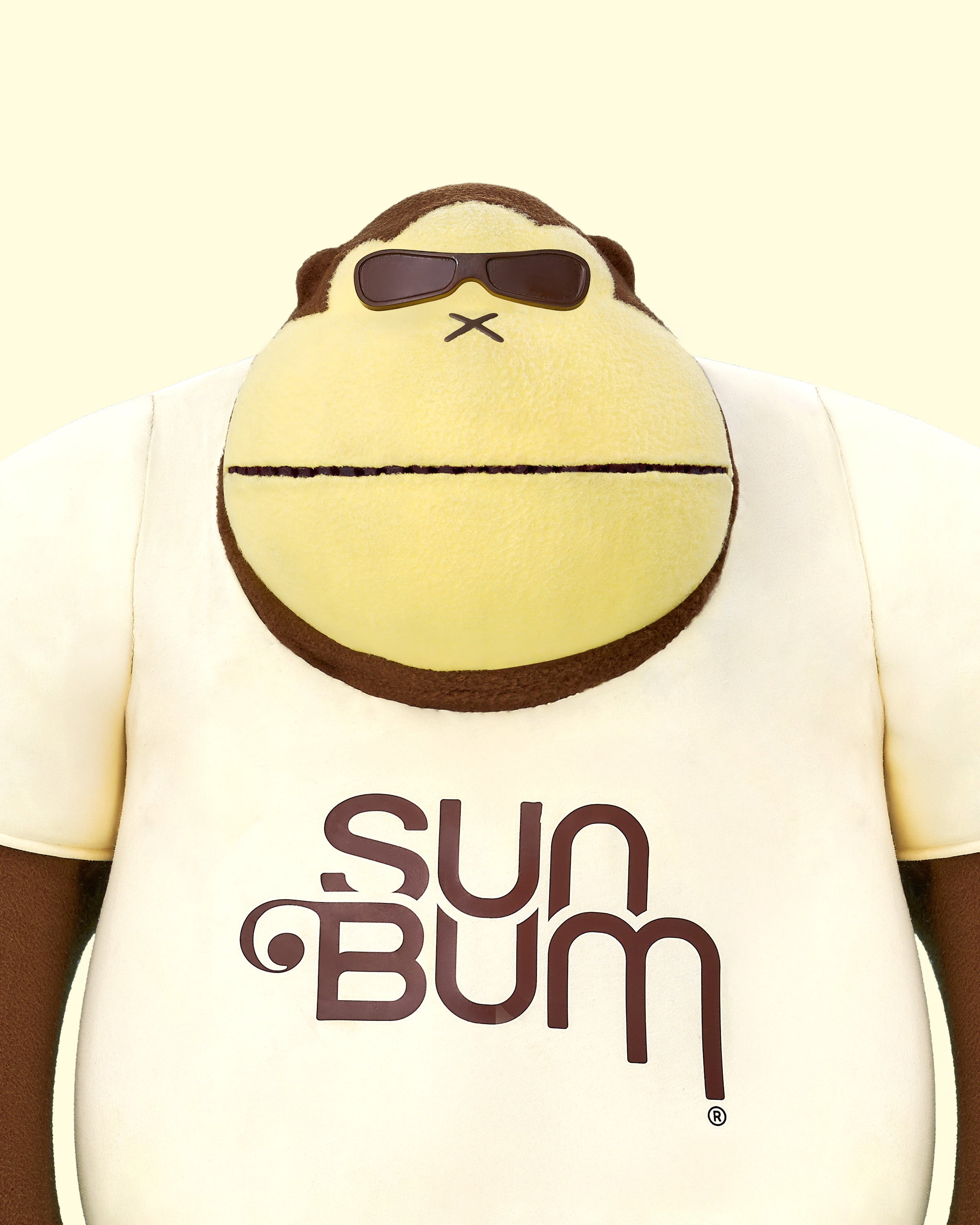 Sun Bum's mascot Sonny wearing a shirt that says Trust the Bum