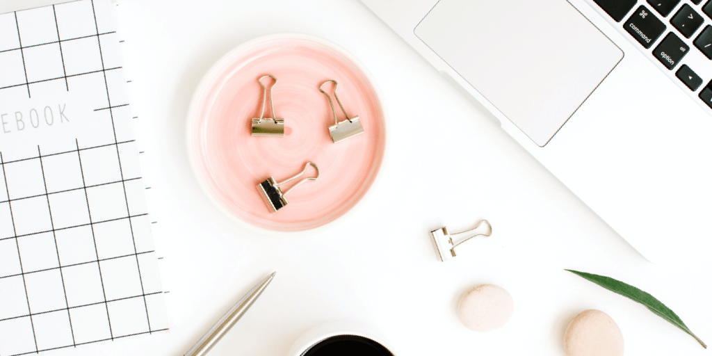 Building a brand on instagram header image - gold binder clips on pink dish